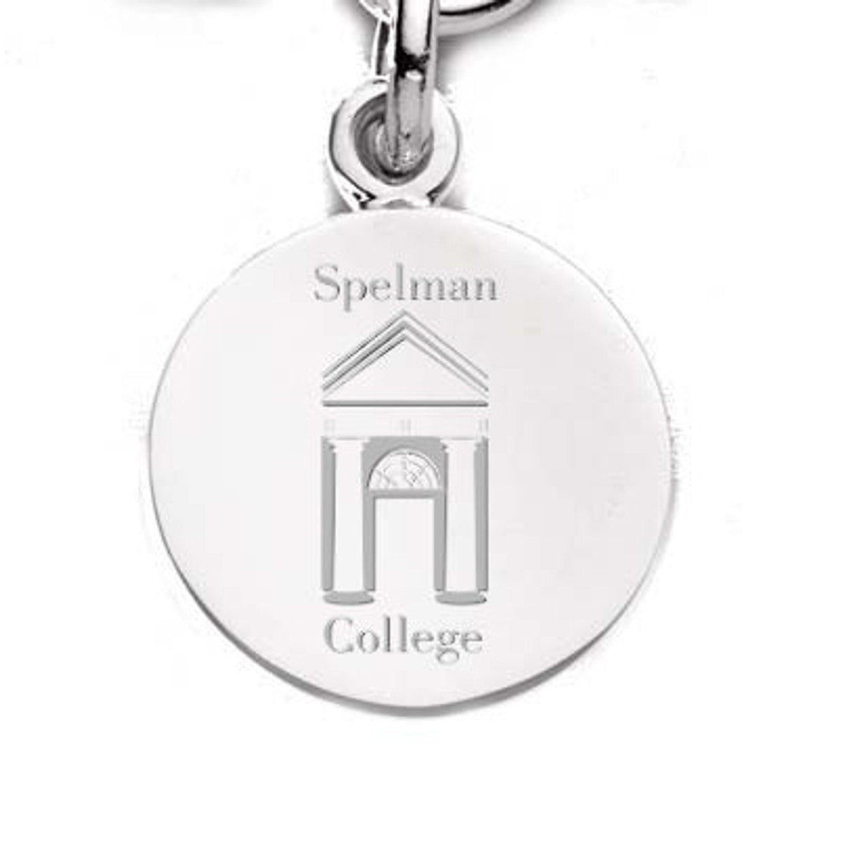 Spelman Sterling Silver Charm | M.LaHart & Co