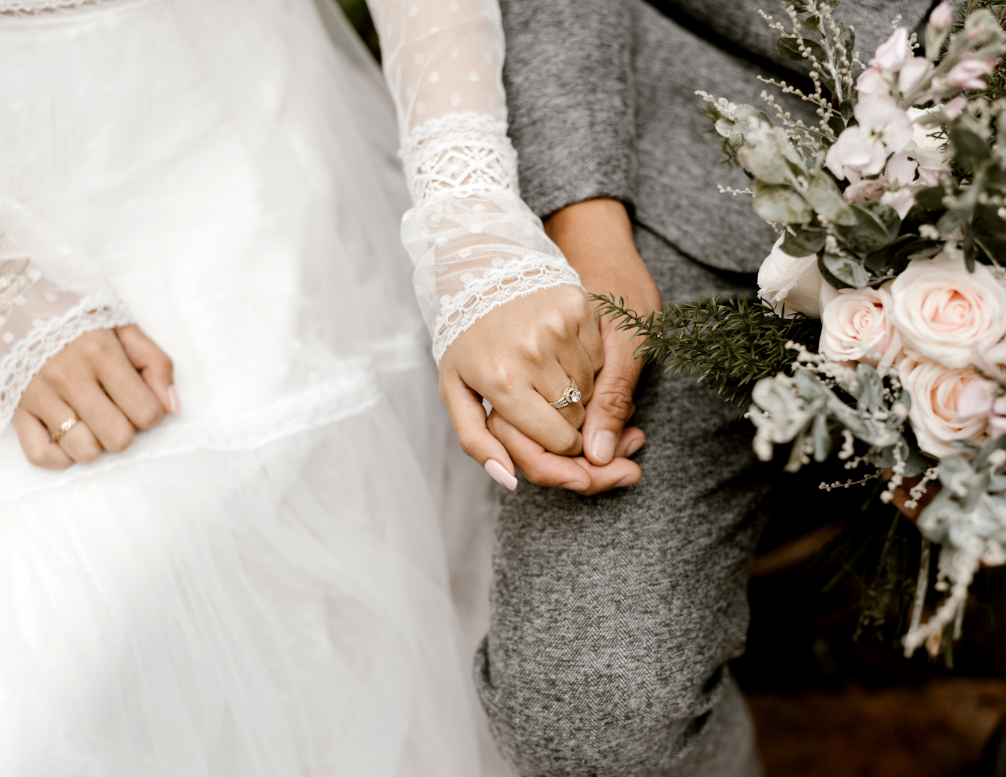Bride and Groom holding hands