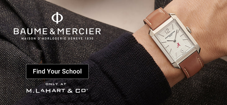 Baume & Mercier watch on a wrist with promotional text for M. Lahart & Co.