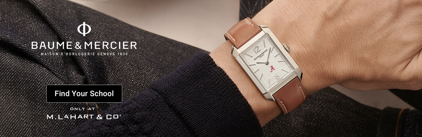 Baume & Mercier watch on a wrist with a blurred background